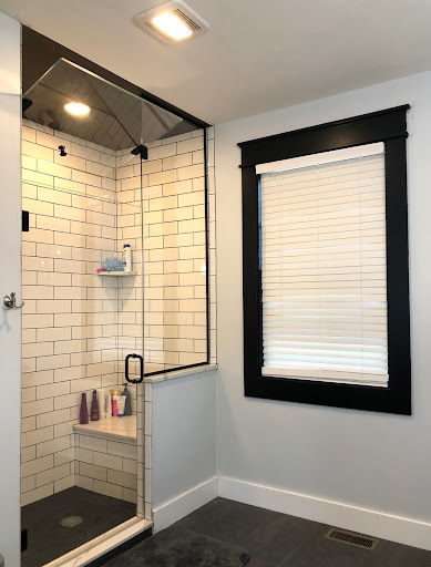 A steam shower in Massachusetts with custom shower doors.