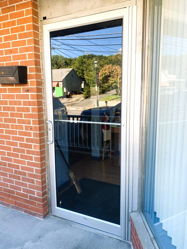 Storefront glass solutions can include replacement doors like this one.