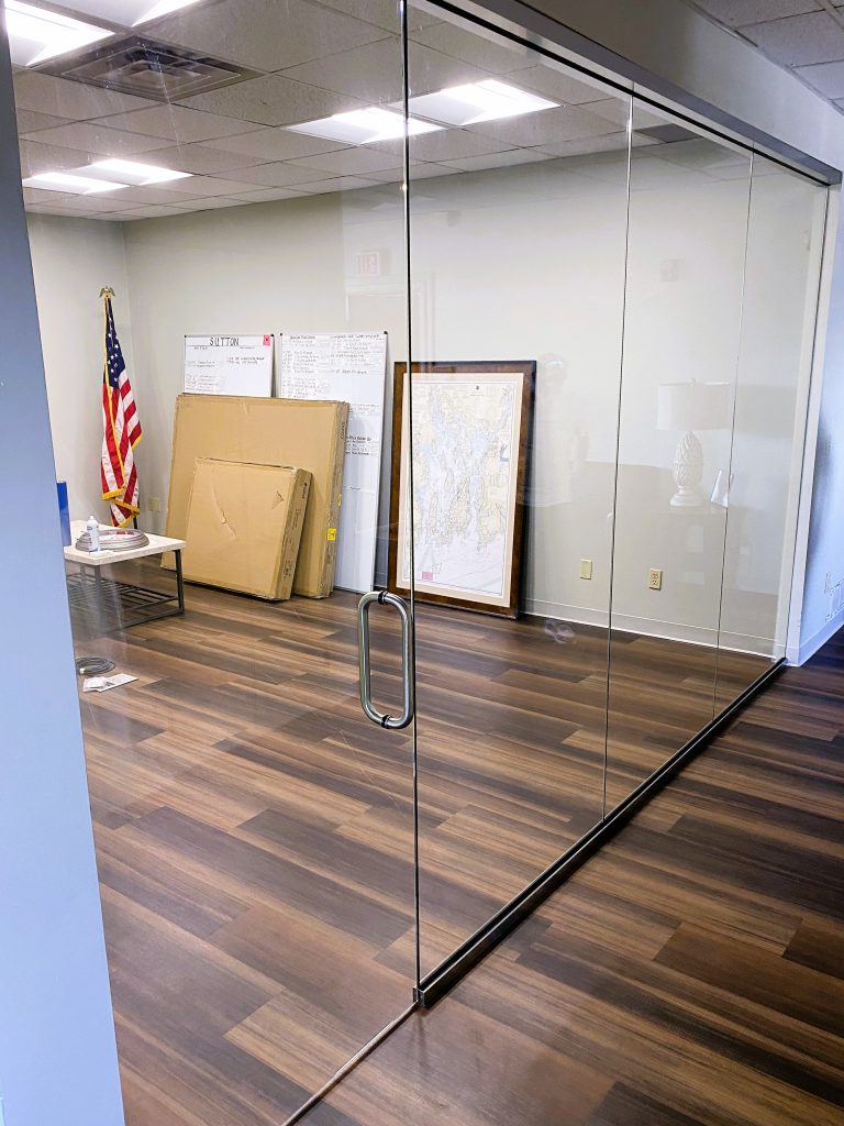 Glass conference room with glass doors